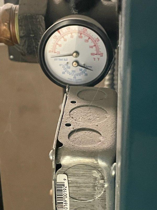 Responded to no heat call on Burnham Series 2 boiler with temperature not rising above 57 degrees. Upon arrival, confirmed thermostat was calling for heat but high limit switch remained open, preventing burner operation. Diagnosed faulty high limit control causing system lockout, replaced defective limit switch, and restored proper boiler operation with system now heating to setpoint.