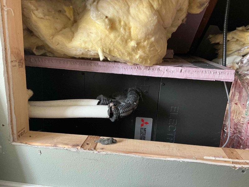 Responded to a service call for a 7-year-old Mitsubishi heat pump system displaying recurring P4 error code. Upon inspection, discovered the moisture sensing puck in the drain pan was tripped despite no visible moisture present. Customer reported the error code first appeared during heating mode in February, which was significant since heat pumps do not produce condensate during heating operation. Diagnosed the moisture sensor as faulty based on this information and the lack of actual moisture in the pan. Tested system operation in both heating and cooling modes, confirming proper functionality with no refrigerant charge issues detected. All other system components operating within normal parameters. Recommended replacing the existing moisture sensing puck with a mechanical float-type switch to provide more reliable overflow protection and reduce future failure potential. Submitted parts quote for float switch installation and awaiting customer approval to proceed with replacement.