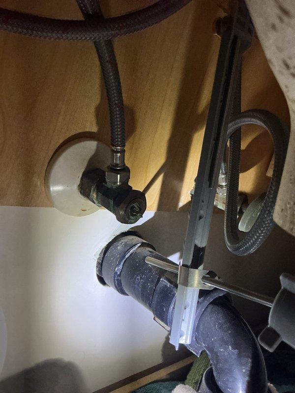 Responded to service call for dripping shower with running spout and unusual noises. Upon inspection, diagnosed faulty shower valve cartridge and defective tub spout causing the water leak and operational issues. Documented existing conditions with photographs showing the chrome shower valve assembly with exposed cartridge mechanism and the tub spout diverter. Provided bid for replacement of both the shower cartridge and spout assembly to restore proper function and eliminate the dripping condition.