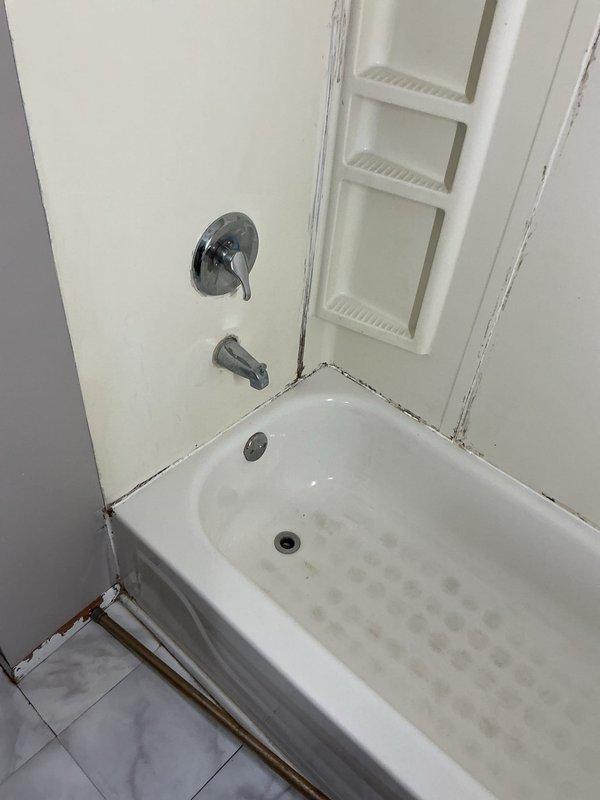 Responded to service call for property that had been winterized and shut down. Upon arrival, assessed plumbing systems throughout the residence. Inspected non-functional toilet in bathroom with pedestal sink, noting facility required reactivation after extended closure. Evaluated kitchen sink with reported drainage issues. Documented bathroom conditions including toilet, pedestal sink with chrome fixtures, and bathtub/shower combination showing signs of extended disuse and deteriorated caulking at seams. Tested plumbing systems to determine extent of winterization impact. Coordinated with advisor to provide comprehensive bid for necessary repairs and system restoration to bring all fixtures back to operational status.