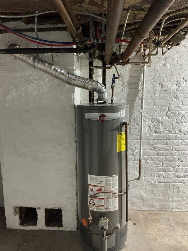 Performed complimentary plumbing inspection for new homeowner at historic 1901 residence. Evaluated existing water heater and complete plumbing system, documenting conditions with photographs. Prepared bid proposal for whole-house repipe and new water heater installation based on assessment findings.