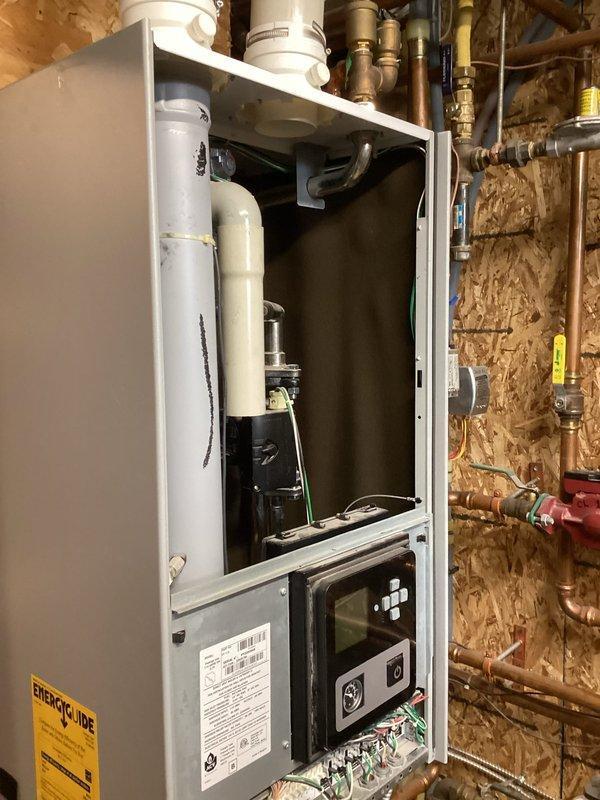 Completed Triangle Tube boiler recall warranty service involving installation of spark ignition kit and CO boiler interlock kit. Replaced ignitor, power module, control board, and combustion components per manufacturer recall specifications. Cycled system through multiple heating cycles, verified proper operation, and set combustion parameters on both high and low heating modes. All systems operating within normal parameters upon completion.