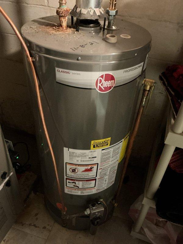 Completed comprehensive furnace tune-up and inspection on 11-year-old Bryant heating system. All components tested and verified operating within manufacturer specifications, including blower motor, heat exchanger, ignition system, and safety controls. Carbon monoxide levels measured in flue and confirmed safe. Inspected condensate drain lines, refrigerant lines, and ductwork connections—all found in proper working condition with no immediate concerns. During inspection, observed water leak on pipe connection at Rheem water heater; customer advised of issue and confirmed they have plumber to address repair. Furnace system fully operational with no deficiencies noted.