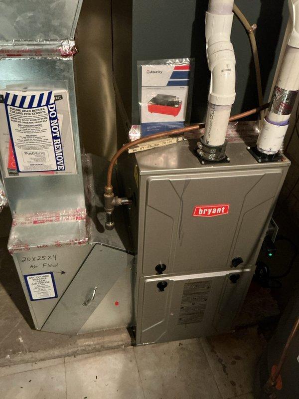 Completed comprehensive furnace tune-up and inspection on 11-year-old Bryant heating system. All components tested and verified operating within manufacturer specifications, including blower motor, heat exchanger, ignition system, and safety controls. Carbon monoxide levels measured in flue and confirmed safe. Inspected condensate drain lines, refrigerant lines, and ductwork connections—all found in proper working condition with no immediate concerns. During inspection, observed water leak on pipe connection at Rheem water heater; customer advised of issue and confirmed they have plumber to address repair. Furnace system fully operational with no deficiencies noted.