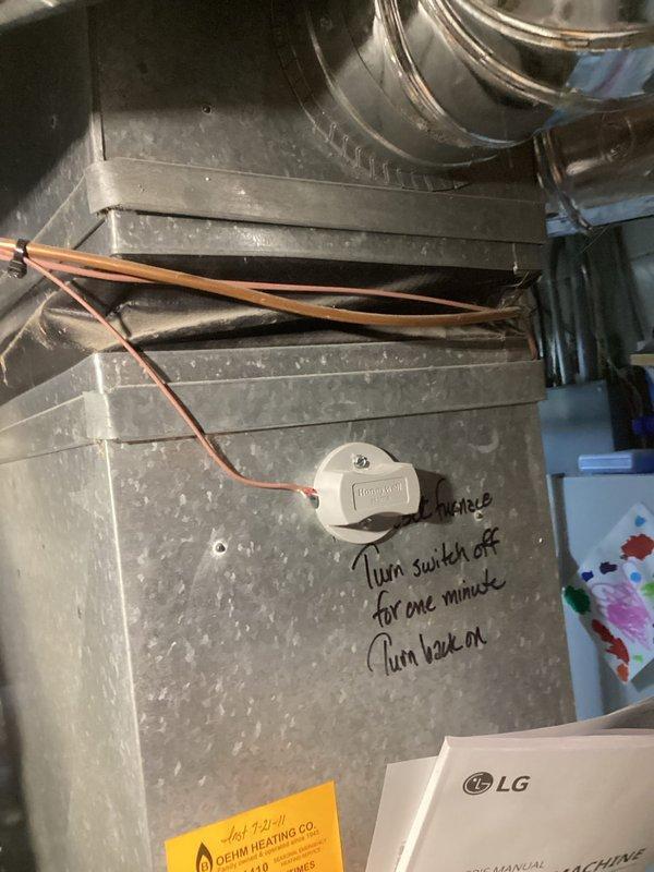 Responded to service call for heat pump making loud noise every 30 seconds with flickering lights and irregular cycling. Upon inspection, found outdoor coil completely iced over, preventing proper system operation. Verified thermostat settings, wiring connections, and outdoor temperature sensor functionality—all reading correctly. Adjusted defrost cycle settings to extended mode to allow thorough coil thawing. Monitored system through multiple heating cycles to confirm proper defrost operation, heat pump functionality, and automatic changeover to auxiliary furnace heating. System restored to normal operation with proper cycling between heat pump and furnace modes.