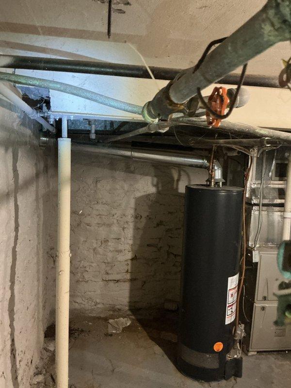 Responded to low hot water pressure complaint, particularly affecting upstairs fixtures. Upon inspection, identified aging galvanized piping system and older water heater as primary causes of reduced flow. Cold water pressure remained adequate throughout the property. Documented existing plumbing infrastructure conditions with photographs and provided estimate for complete system replacement to restore proper water pressure and prevent future issues.