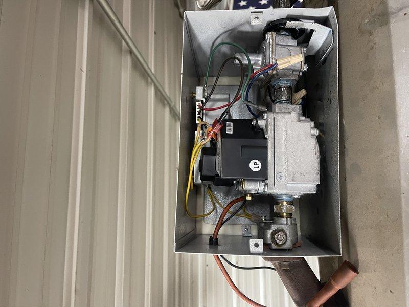 Responded to no-heat call at fire station regarding non-functional tube heater. Discovered previous contractor had abandoned the repair job, leaving missing parts on one burner and holes in the tubes. System appears to be an older model with significant wear. Coordinated with team member to evaluate replacement options, including pricing for a new unit heater and researching parts availability for the existing system.