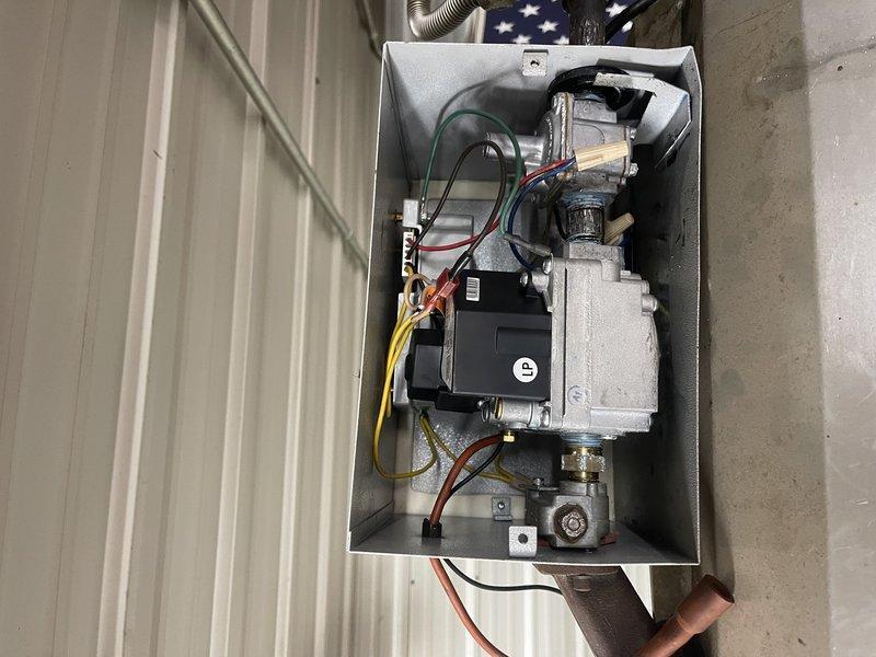 Responded to no-heat call at fire station regarding non-functional tube heater. Discovered previous contractor had abandoned the repair job, leaving missing parts on one burner and holes in the tubes. System appears to be an older model with significant wear. Coordinated with team member to evaluate replacement options, including pricing for a new unit heater and researching parts availability for the existing system.