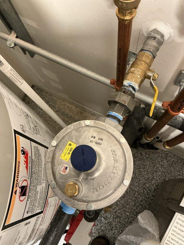 Diagnosed Bradford White water heater displaying error code 16/61 indicating gas valve failure. Confirmed defective gas valve from factory. Removed original component and installed new gas valve, restoring hot water functionality to the unit.