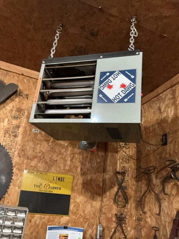 Responded to service call for Hot Dawg shop heater (10-15 years old) that was running but not producing heat. Upon arrival, customer had already performed preliminary cleaning. Diagnostic testing revealed no operational issues after multiple test cycles. System is now functioning properly with adequate heat output.