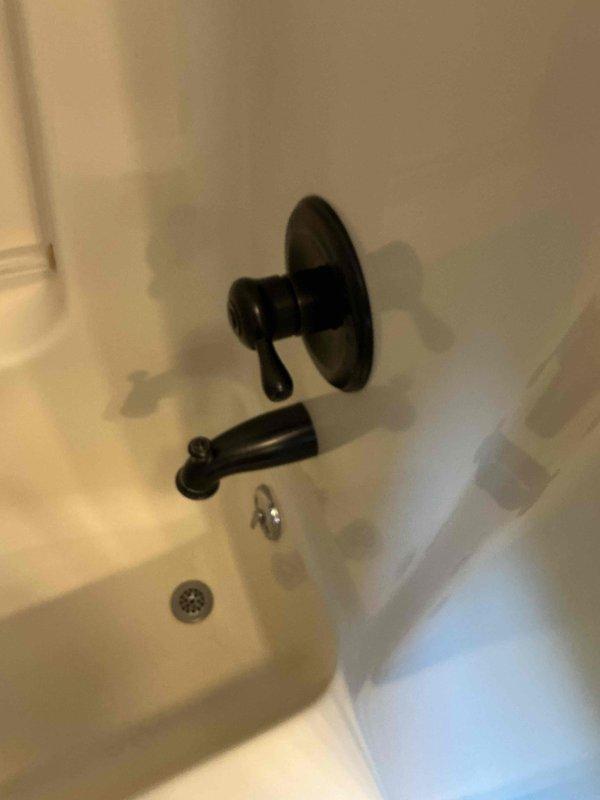 Replaced 20-year-old Mansfield toilet with new Gerber Viper biscuit two-piece standard round toilet. Installation included new wax ring and bolts. Customer opted for replacement rather than multiple repairs to aging fixture.