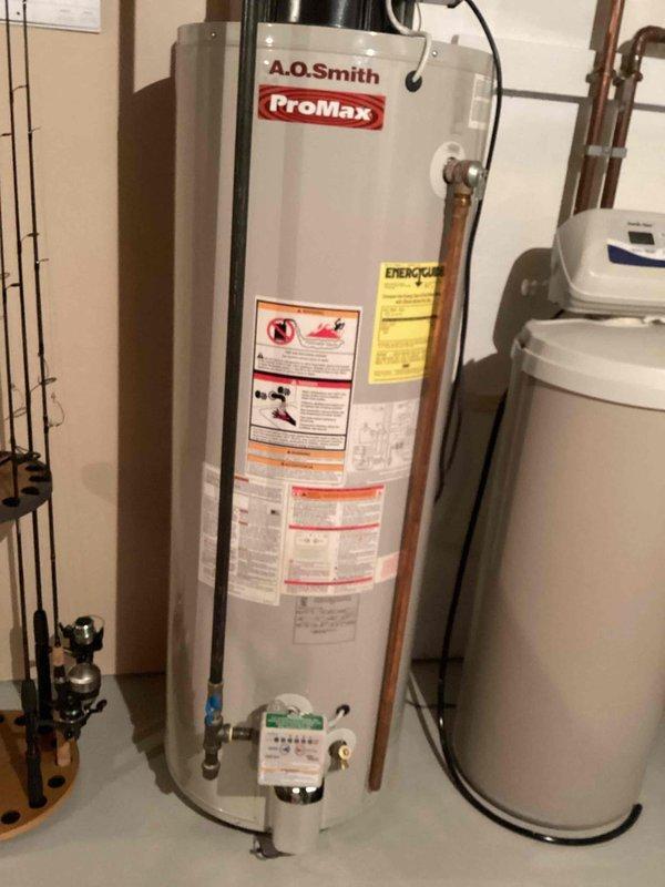 Performed preventative maintenance tune-up on 18-year-old LP furnace. Inspected heat exchanger with no compromises found, verified condensate drainage, and tested system operation with 47-degree temperature rise. Identified inducer motor drawing higher than specified amperage (3.4A vs. 2.8A spec) with audible noise; balanced blower wheel and confirmed all other electrical components within specifications. Recommended obtaining estimate for inducer motor replacement.