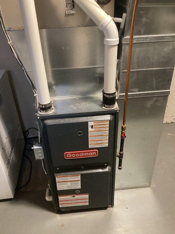 Diagnosed and repaired a 12-year-old Goodman propane furnace (Model GMSS920402BNAA) that was failing to ignite. Determined the gas valve was faulty despite receiving proper voltage, and replaced it with the correct specification valve. Following installation, leak-tested all fittings, set proper LP gas pressures, and verified complete system operation, restoring heat to the residence.