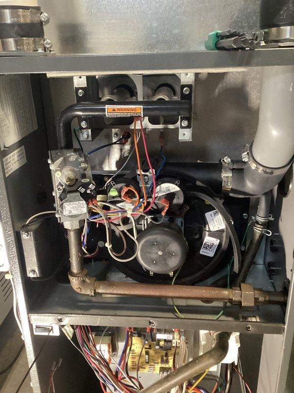 Diagnosed and repaired a 12-year-old Goodman propane furnace (Model GMSS920402BNAA) that was failing to ignite. Determined the gas valve was faulty despite receiving proper voltage, and replaced it with the correct specification valve. Following installation, leak-tested all fittings, set proper LP gas pressures, and verified complete system operation, restoring heat to the residence.