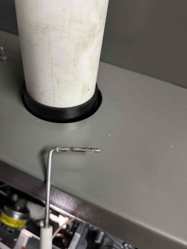 Responded to no heat call for 2-year-old LP furnace that wasn't activating when thermostat was adjusted. Diagnosed dirty flame sensor as primary issue and performed complete system tune-up. Replaced broken high-fire pressure switch hose discovered during service inspection. System now functioning properly with normal heat operation restored.