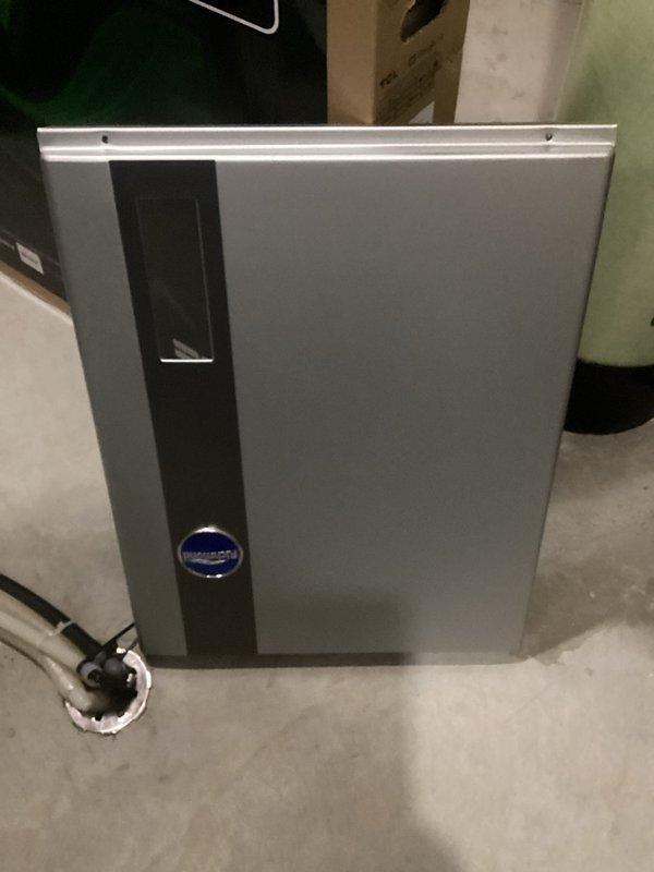 Responded to service call for 12-4 LP water heater under Richmond warranty. Performed diagnostic assessment and measured gas flow rate per manufacturer's request. Inspection revealed improper venting configuration and undersized gas line supplying the unit. Documented internal components and installation conditions with photographs. Provided estimate for replacement with 50-gallon propane power vent water heater to address code compliance issues and ensure proper operation.