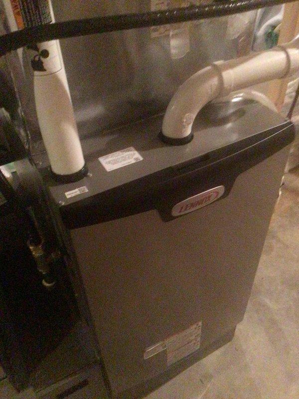 Colfax, WI - Responded to customer complaint regarding inadequate heating performance and temperature control issues on Coleman furnace installed in November. Performed comprehensive system inspection and operational testing. Identified thermostat smart recovery setting was causing premature furnace cycling, resulting in perceived inadequate heating. Adjusted thermostat configuration by disabling smart recovery anticipation feature that was activating heating system ahead of scheduled setpoint times. Verified proper furnace operation, airflow, and temperature rise across heat exchanger. Recommended monitoring system performance with revised thermostat settings and suggested potential ductwork evaluation if heating concerns persist.