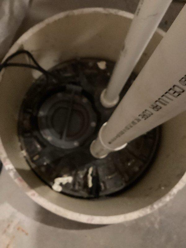 Successfully installed a high water alarm system on the existing sewer ejector to alert homeowner of potential water backups or flooding in the septic system. The two-hour installation included mounting the sewer alert mechanism to the pump basin, ensuring proper connection to the existing drainage infrastructure. All components were verified operational before completion, providing an effective early warning system for basement water issues.