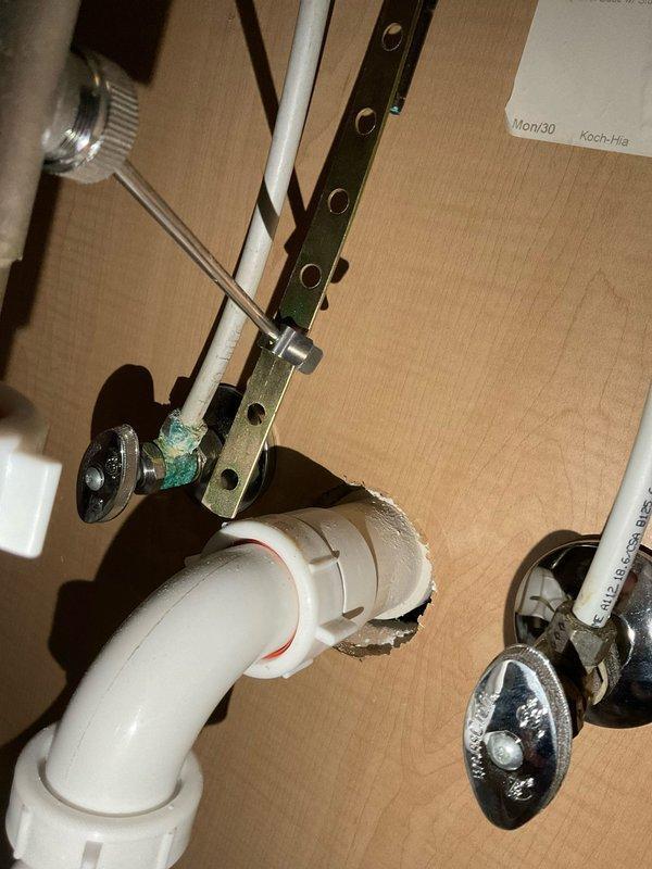 Performed comprehensive plumbing inspection of residential property, examining both exposed PVC and copper pipe installations. Inspected wall-mounted plumbing components, water meter/regulator valve, and connection points for proper sealing and secure mounting, with particular attention to the dehumidifier/HVAC system integration with the home's plumbing infrastructure.