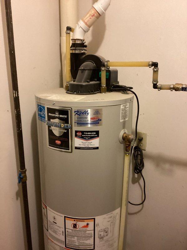 Conducted comprehensive plumbing inspection on 20-year-old residential unit with focus on water heater system and associated plumbing connections. Verified proper installation and functionality of water heater, circulation pump, copper supply lines, and PVC drainage components. All plumbing systems found to be in good working condition; noted recommendation for dishwasher replacement.