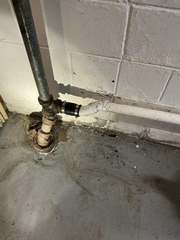 Responded to service call for clogged laundry drain. Diagnosed complete blockage in drainage line causing standing water. Successfully cleared obstruction using mechanical drain machine, restoring proper flow through the aging pipe system which showed signs of mineral buildup and corrosion at connection points.