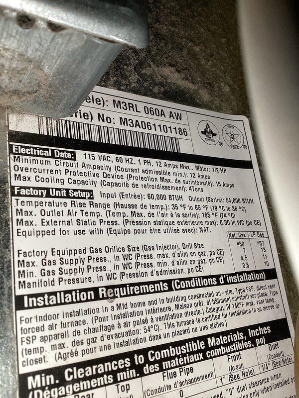Diagnosed and serviced 10+ year old Westinghouse furnace (Model M3RI 060A AW) with intermittent no-heat condition. Found completely plugged condensate drain causing water backup into collector box and inducer motor, which triggered the inducer motor limit to shut down system operation. Cleared blocked drain line to restore proper drainage. Inspection revealed advanced rust on heat exchanger, leaking collector box, and corroded burners causing inconsistent ignition across all burners. System is operational after service but showing significant age-related deterioration.